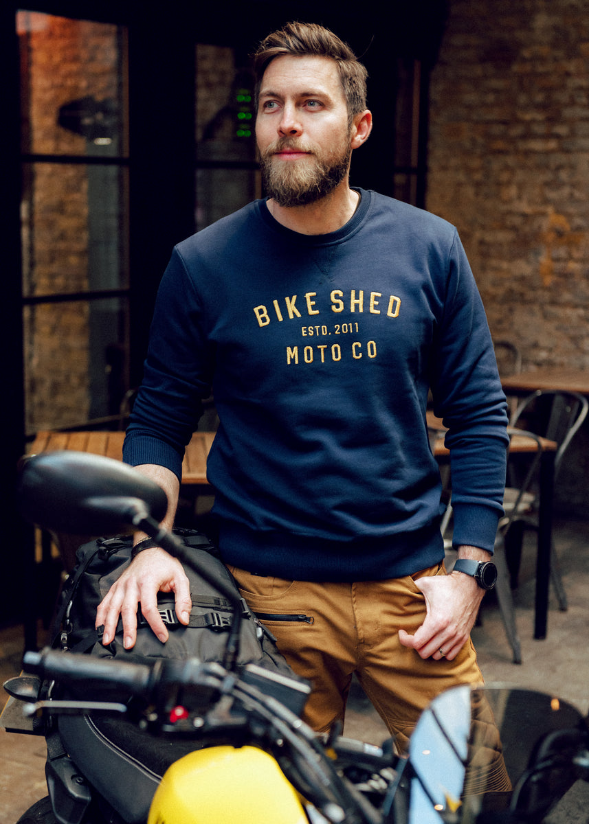 Alen wearing our BSMC Moto Co. logo Sweatshirt  - Navy/Mustard