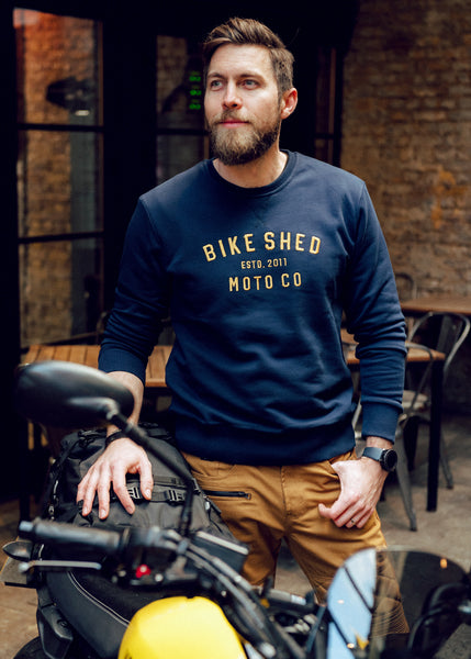 Alen wearing our BSMC Moto Co. logo Sweatshirt  - Navy/Mustard
