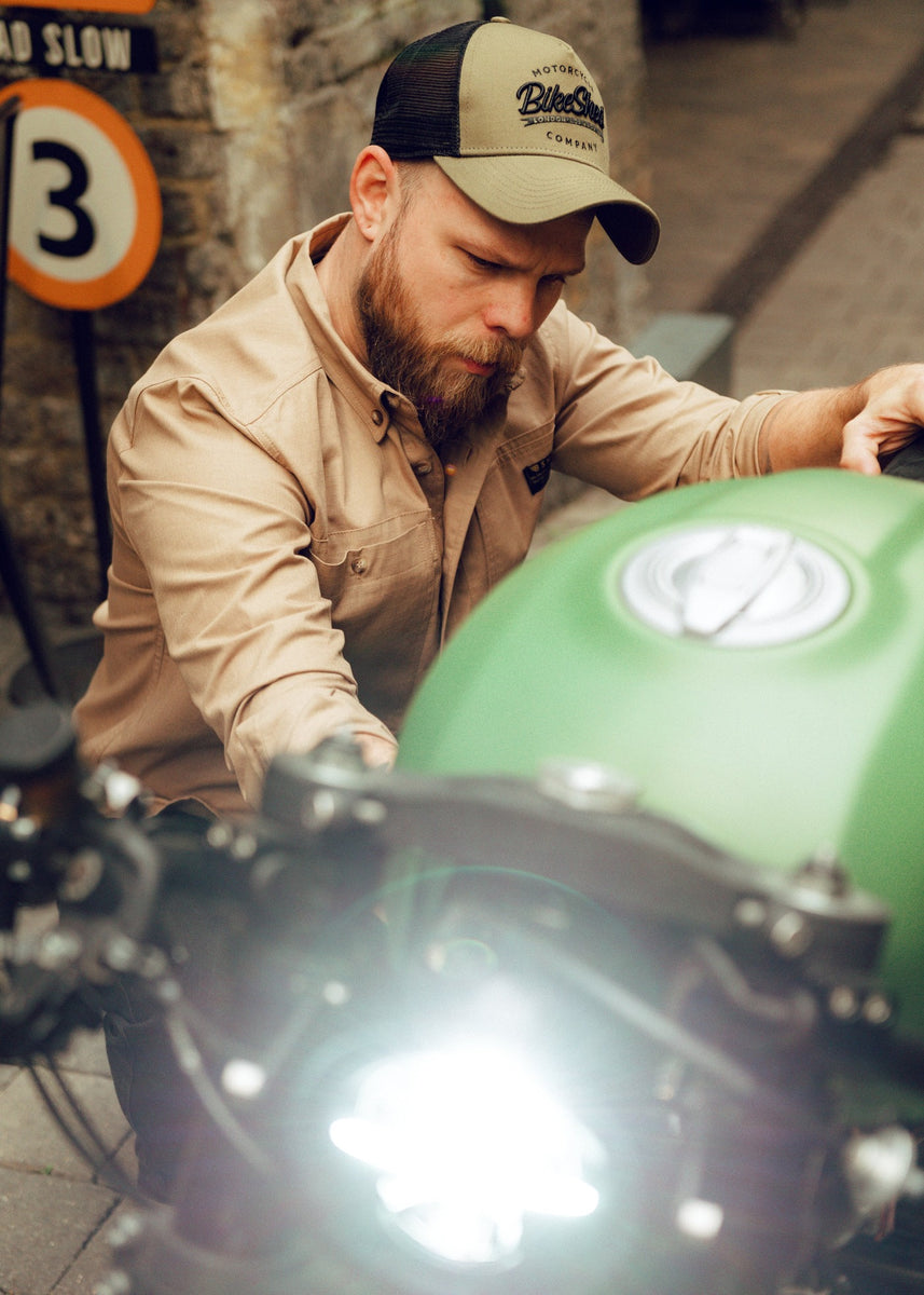 Jimbo inspecting his bike wearing our BSMC Ripstop Utility Shirt MKII - TAN