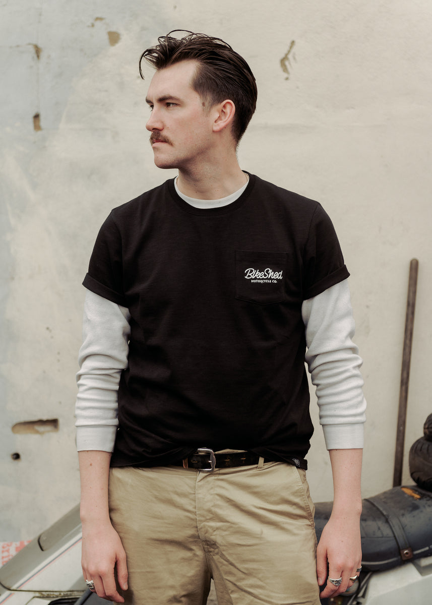 Joe posing in our BSMC Logo Chain Embroidered T Shirt - Black