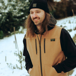 Alex in the snow wearing out BSMC Crest Knit Beanie - Black