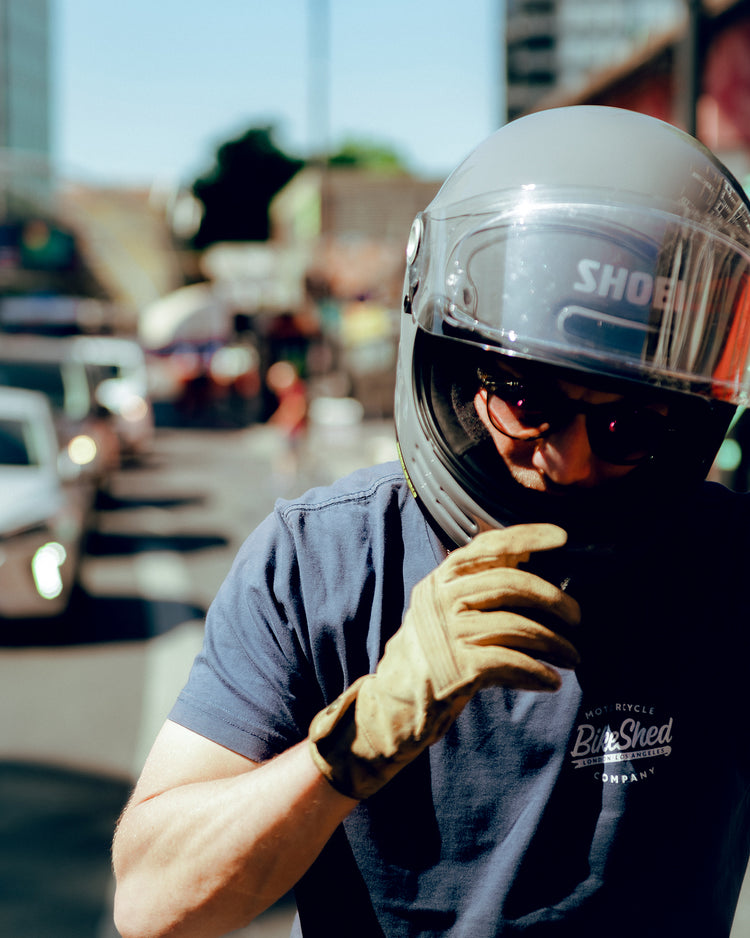 Steve adjusting his helmet while wearing our BSMC Company T-Shirt - Navy