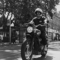 Steve riding his Triumph in London wearing our BSMC Company T-Shirt - Black
