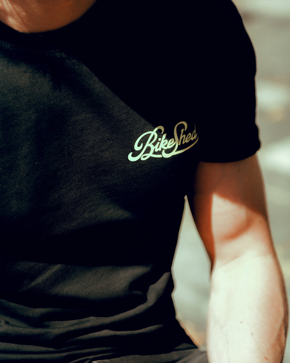 Chest logo close up on our BSMC Motorcycle Garage T Shirt - Black & Gold