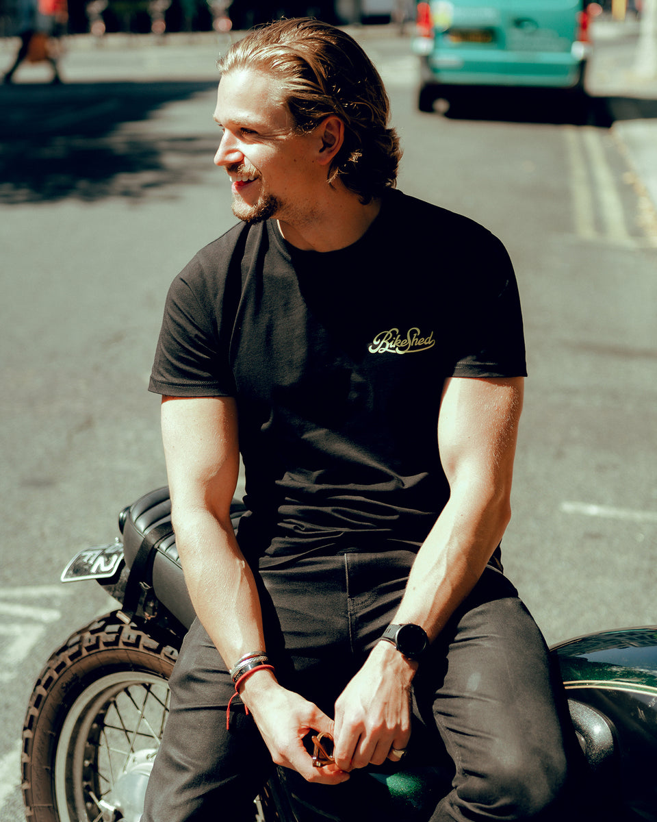Harry taking a rest while wearing BSMC Motorcycle Garage T Shirt - Black & Gold