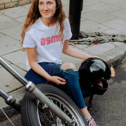 Leoma wearing our BSMC Women's '77 T Shirt - White/Red