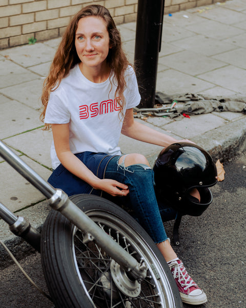Leoma wearing our BSMC Women's Logo '77 T Shirt - White/Red