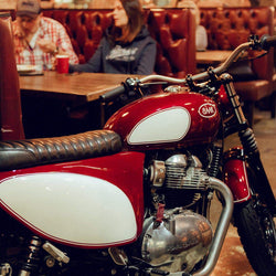 Baak motorcycle in our London venue near the dining booths the leather for the card wallets originates from
