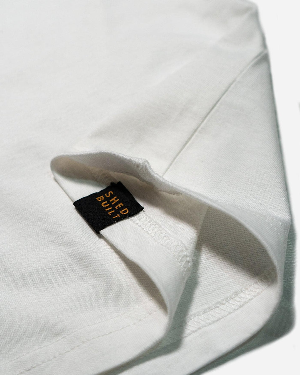 Hem tag close up of our Bike Shed Moto Co. Company T-Shirt - Off White