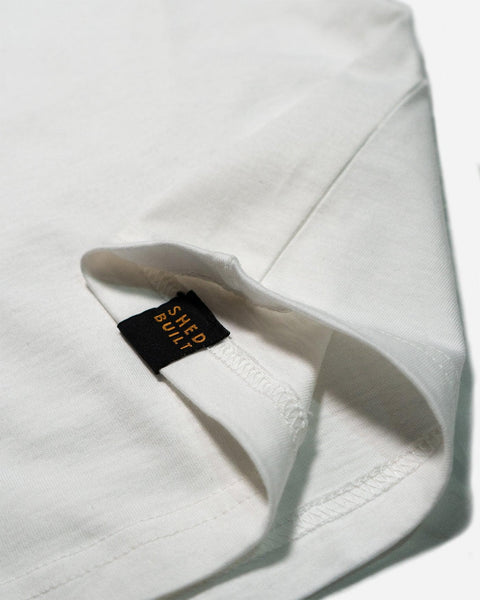 Hem tag close up of our Bike Shed Moto Co. Company T-Shirt - Off White