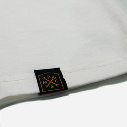 Hem tag close up of our BSMC Company T-Shirt - Off White