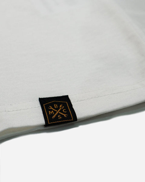 Hem tag close up of our Bike Shed Moto Co. Company T-Shirt - Off White
