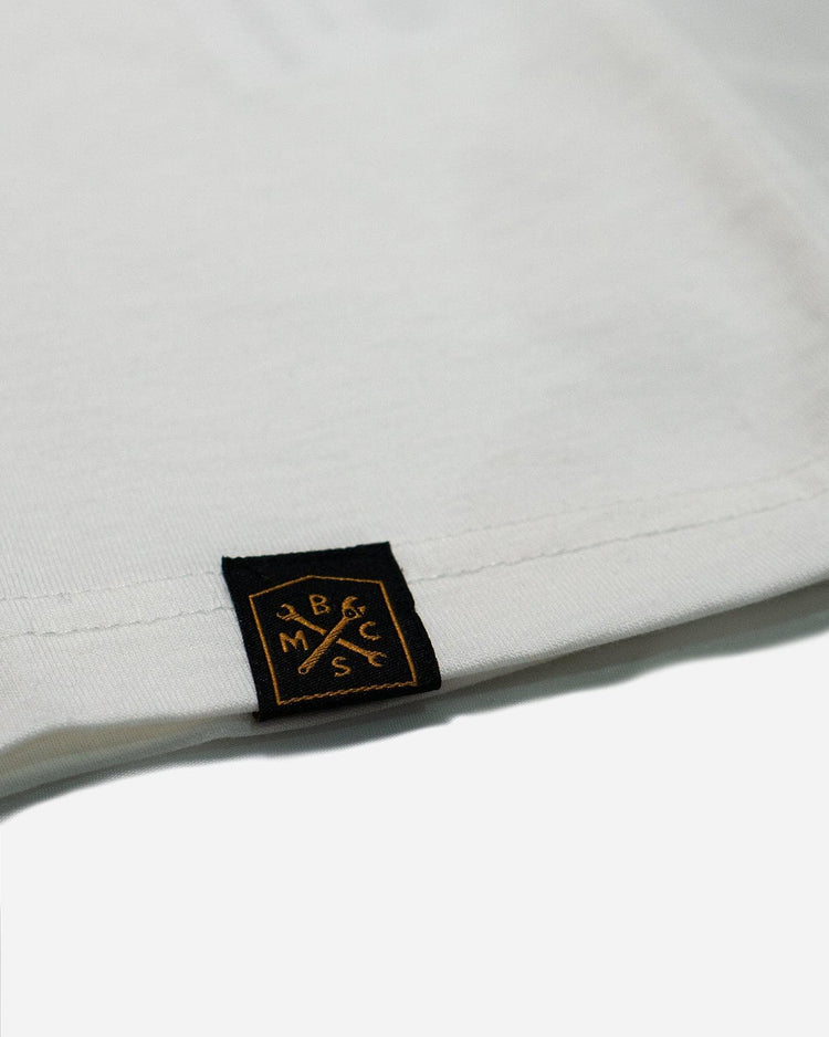 Hem tag close up of our BSMC Company T-Shirt - Off White
