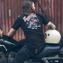 Simon sitting on his Harley wearing our BSMC Dead Dakar Doug T Shirt - Black