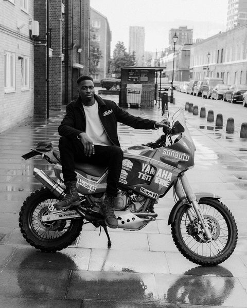 Model sitting on his Yamaha Tenere wearing our Embroidered Motorcycle Club Waffle Long Sleeve T-Shirt - Ecru