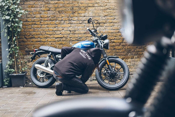 Dan inspecting his Triumph wearing our BSMC ESTD. Hoodie - Black