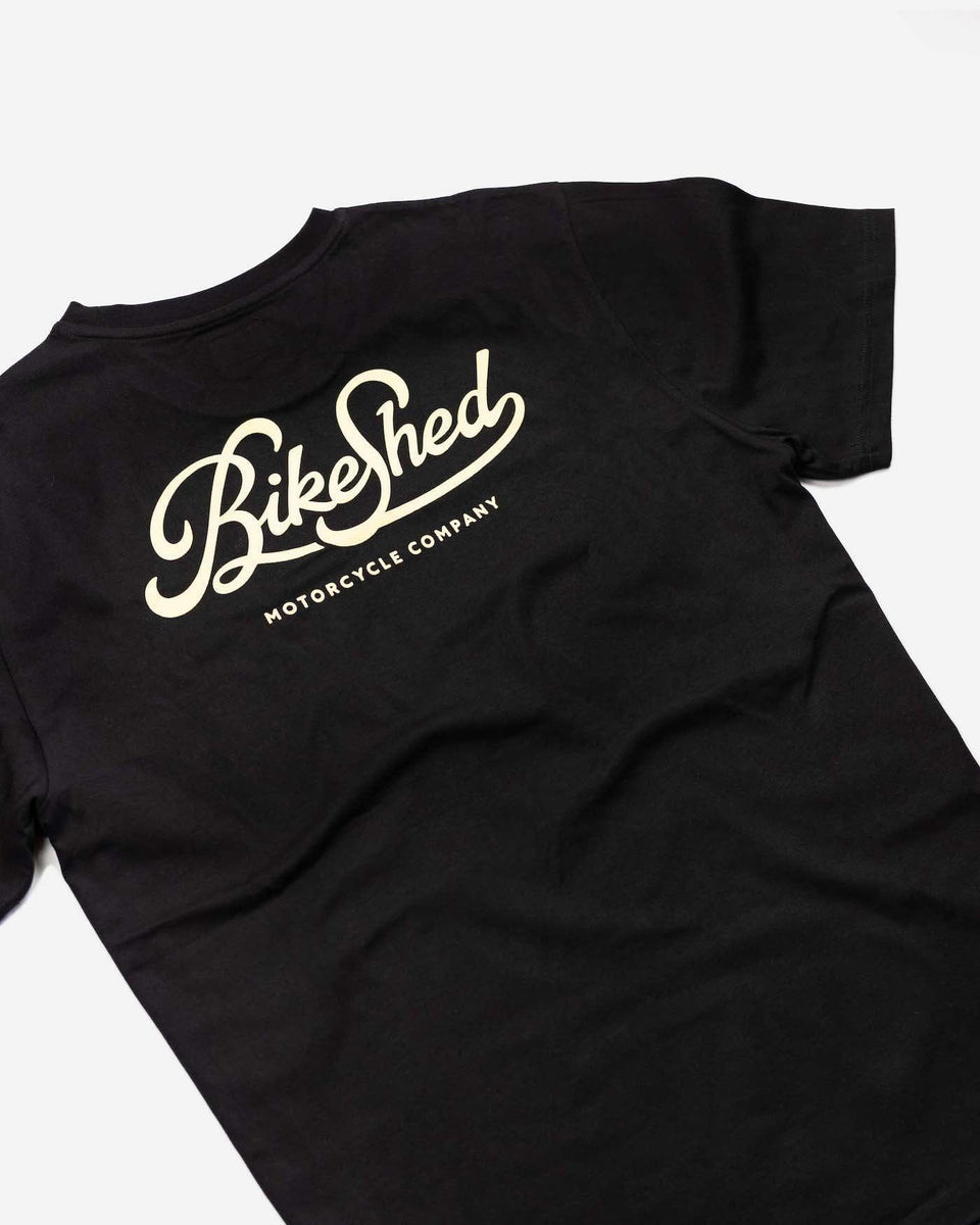 BSMC Motorcycle Garage T Shirt - Black & Gold, side on close up