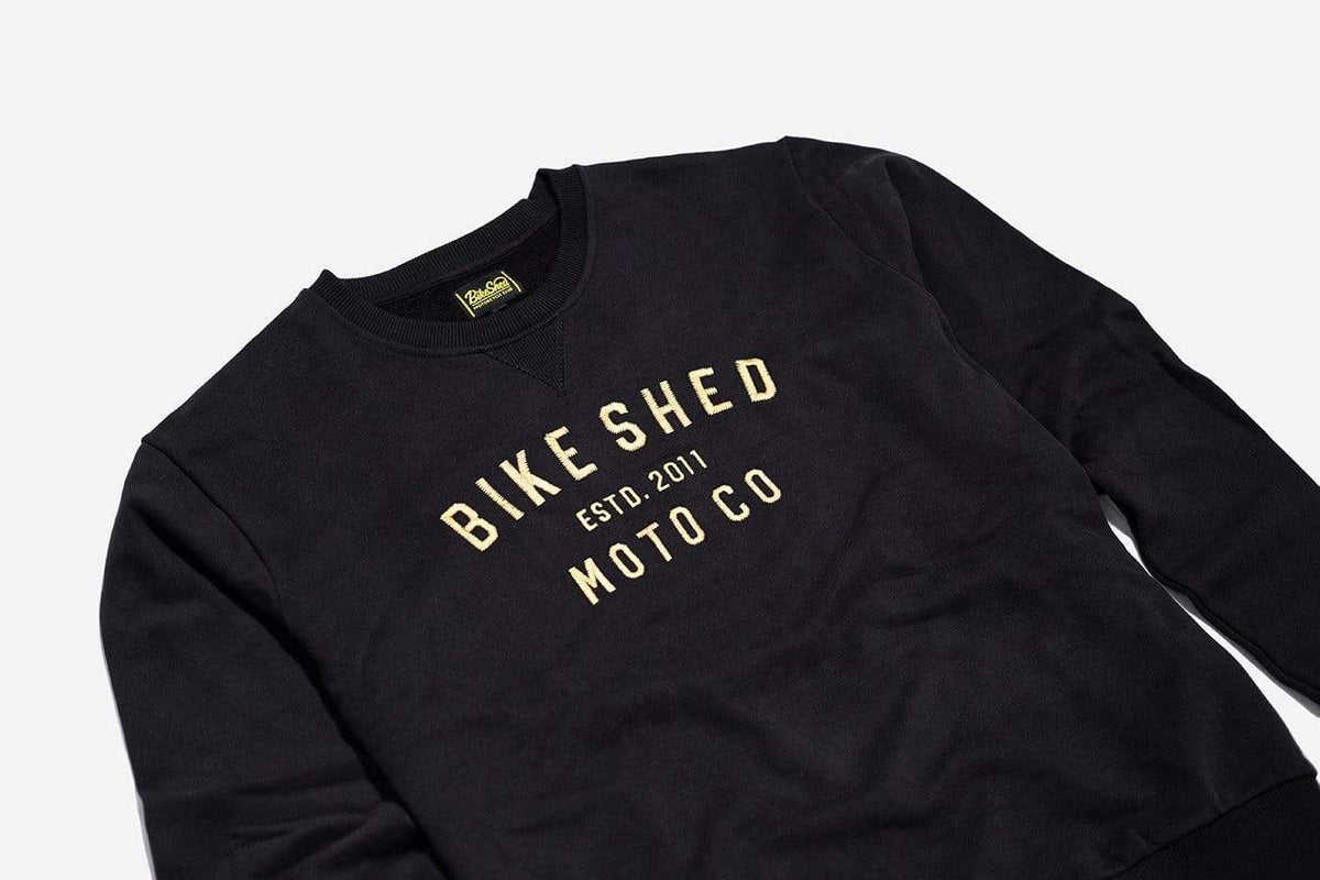 Bike Shed Motorcycle Logo Sweatshirt - Black/Gold, side on close up