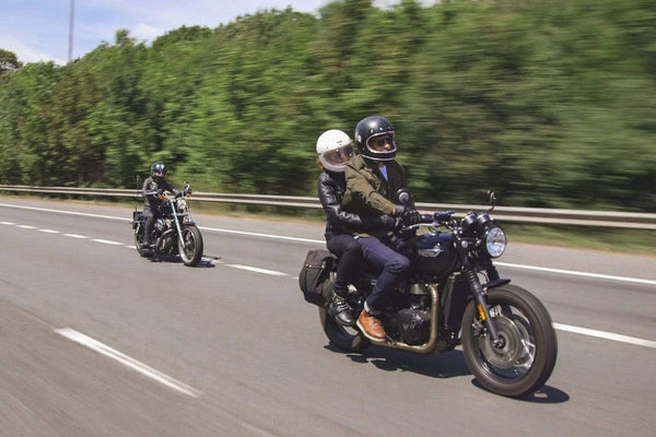 Sam riding his Triumph while wearing our Protective Motorcycle Road Jeans - Raw Indigo