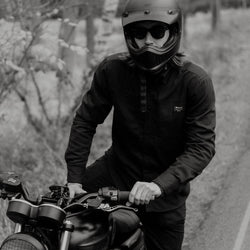 Dan sitting on his Triumph wearing our BSMC Ripstop Utility Shirt MKII - BLACK