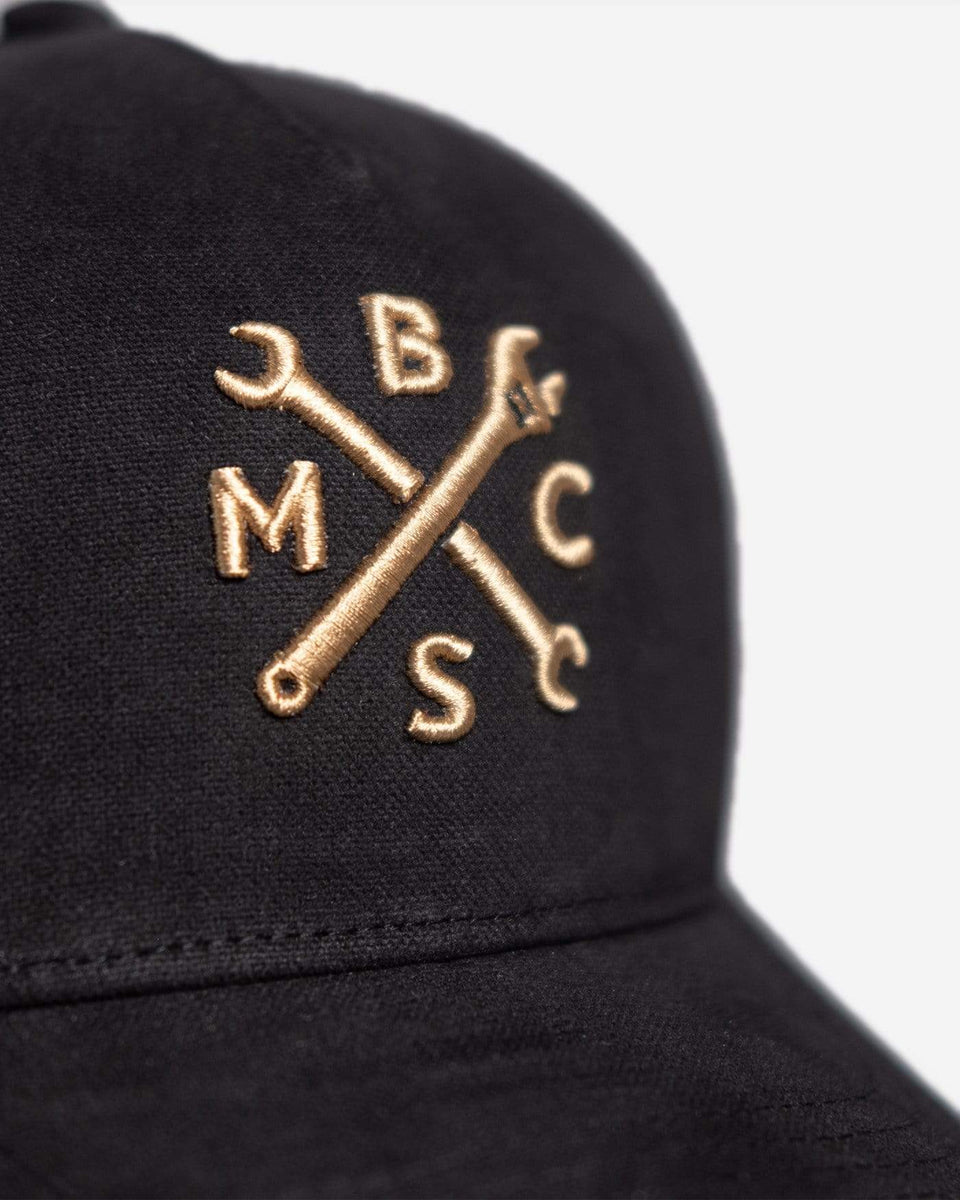 Motorcycle embroidered logo baseball hat - Black & Gold, logo close up