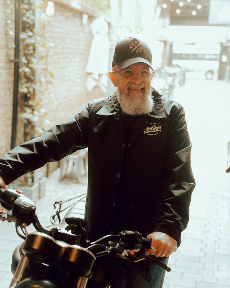 Brian wearing our BSMC Spanners Cap - Black & Gold