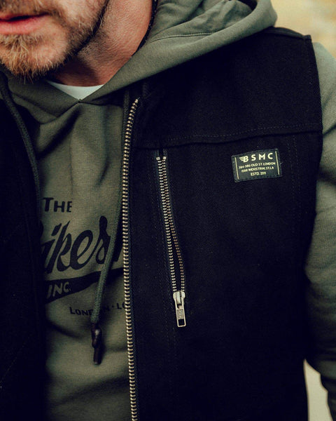 Donny wearing our Motorcycle utility vest with multiple pockets and zipper detailing - Black, close up
