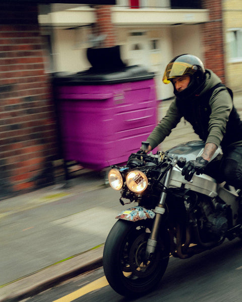 Donny riding his Fireblade wearing our Motorcycle utility vest with multiple pockets and zipper detailing - Black