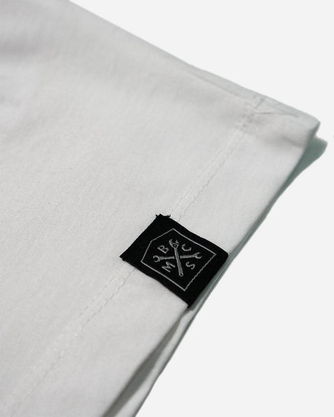 BSMC Women's Logo '77 T Shirt - White/Red, hem tag close up