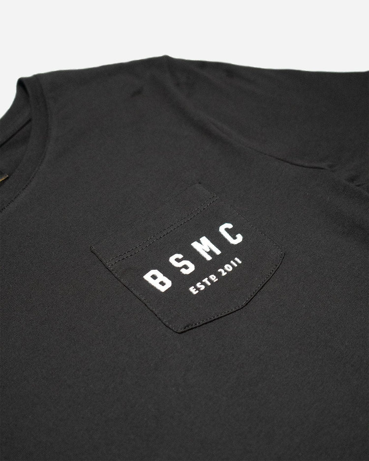 BSMC Women's ESTD. Pocket T Shirt - Black, pocket and logo close up
