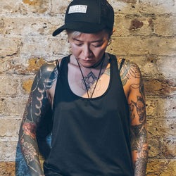 Carrie wearing our BSMC x Royal Enfield Vinplate Cap - Black
