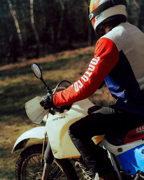 Harry wearing our BSMC XR Motorcycle Race Jersey - WHITE/BLUE/RED riding off road