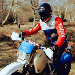 Harry wearing our BSMC XR Race Jersey - WHITE/BLUE/RED riding off road